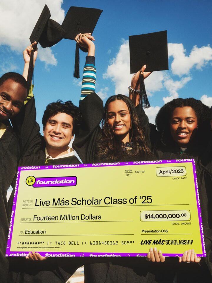 Scholarship winners with check